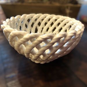 TWO white woven baskets. One 4.5” tall x 6” wide. One 3 x 6”. Vases, trinkets
